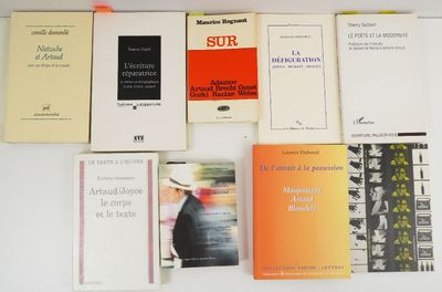 a lot of books that are sitting on a table