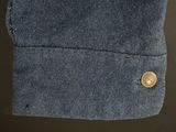 an image of a close up of a button on a shirt