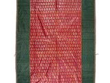 a red and green silk sari with a green border