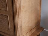 a wooden table with a drawer on top of it