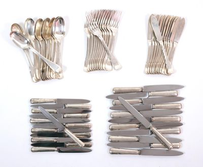 a lot of forks and spoons on the table