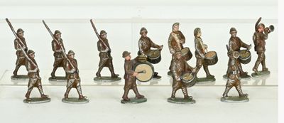 many figurines of men with drums and drums