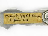 a knife that has a label on it