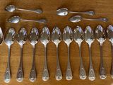 a lot of spoons and spoon spoons on the table