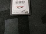 a close up of a black bag with a price tag on it
