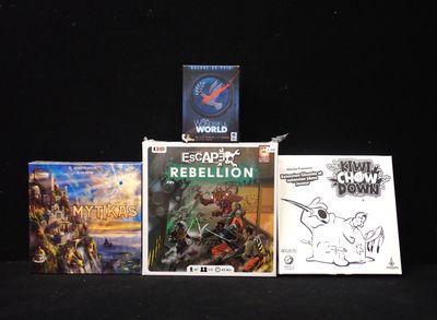 three books that are sitting on top of a table