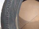 a tire with a cardboard box inside of it