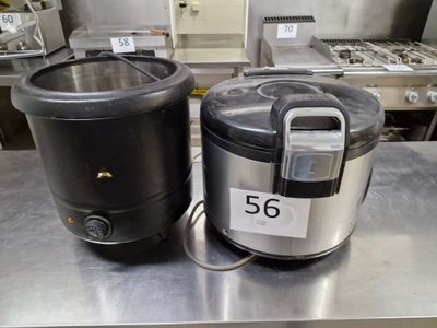 two electric pots sitting on a table in a kitchen
