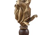 a lamp that is sitting on top of a wooden base