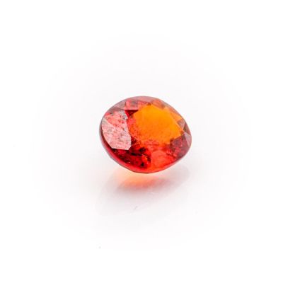 a red and orange diamond on a white surface