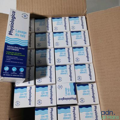 a cardboard box filled with a bunch of soap bars