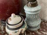 two vases sitting next to each other on a table