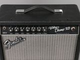 the fender amp is sitting on the table ready to be used