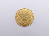 an image of a gold coin on a white surface