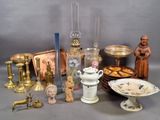 a lot of antique items that are on the table