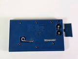 an image of a blue latch on a white surface