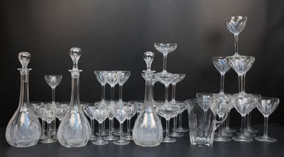 a lot of wine glasses that are sitting on a table