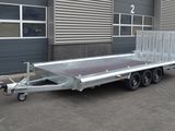 an image of a trailer parked in front of a building