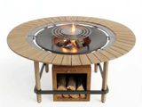 a fire pit with a grill on top of it
