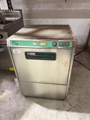 an image of a commercial dishwasher in a kitchen