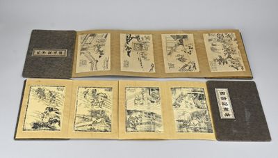 trois livres portant des inscriptions en caractères asiatiques, posés les uns à côté des autres
