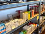a shelf with many different items on it in a store