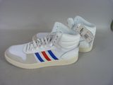 white adidas sneakers with blue, red and white stripes