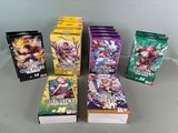 several packs of card games are lined up on a table