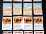 un jeu de cartes sur lesquelles figurent des images de chevaux et de personnes