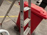 a ladder that is sitting in the middle of a room