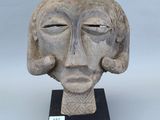 une image représentant une sculpture du visage d'une femme