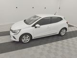 a picture of a white car parked in a garage
