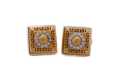 an image of a pair of gold and diamond earrings