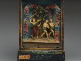 une vieille boîte en bois avec une peinture à l'intérieur