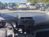 a view of a parking lot from inside of a car