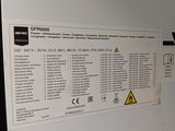 a sign on the wall of a machine that is not working