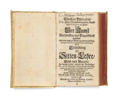 an old book with a black and white title on it