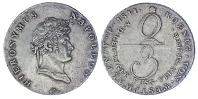 a silver coin with a woman ' s head and a crown on it