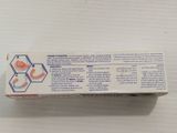 a box of toothpaste sitting on a table