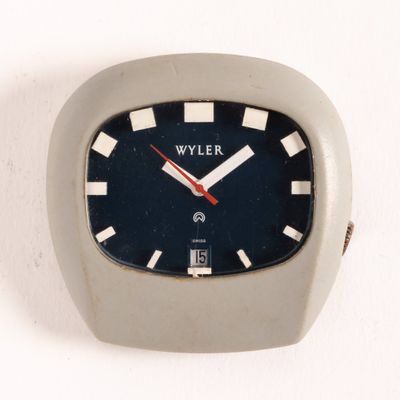 a white clock with a blue face and red hands