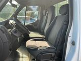 a white van with black seats in the back of it