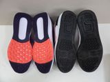 three pairs of shoes are lined up on a table