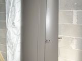 an image of a refrigerator in the corner of a room