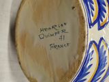 a close up of a vase with writing on it