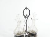 two glass vases that are sitting on a table