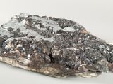 a piece of rock that has some kind of substance on it