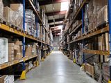 a large warehouse filled with lots of boxes and boxes