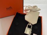 an orange box with a key and a padlock in it