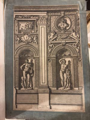 a picture of a book with a picture of statues on it
