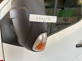 a white van with a sticker on the side of it